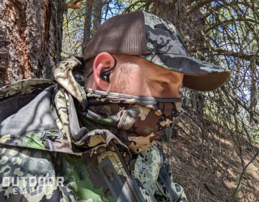 hunter wearing ear buds hearing protection