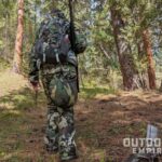 Hunter in the woods with pnuma chisos backpack 1