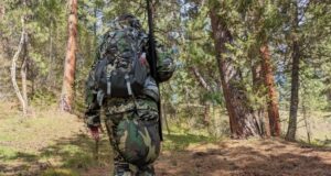 hunter in the woods with Pnuma Chisos Backpack 1