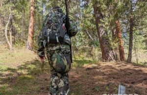 hunter in the woods with Pnuma Chisos Backpack 1