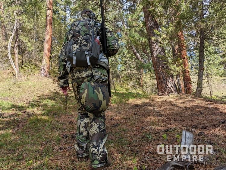 Hunter in the woods with pnuma chisos backpack 1