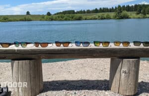 Eight pairs of best smith fishing sunglasses on a bench