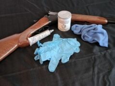 shotgun, wax, soft cloth and gloves