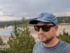 Man wearing Smith Barra sunglasses overlooking Grand Prismatic hot spring in Yellowstone