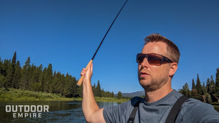 Man tenkara fishing with smith fishing sunglasses on