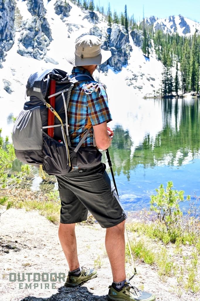 Hiker by the lake with gossamer gear gorilla 50