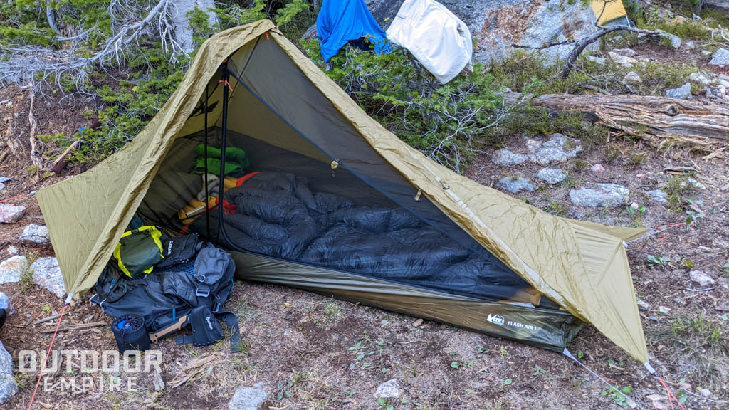 1 man backpacking tent with gear inside