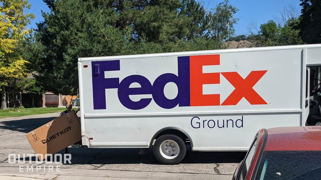 Fedex truck delivering bike package