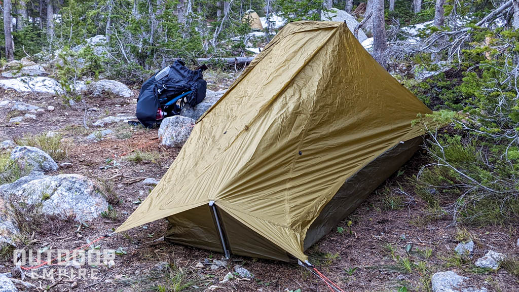 Lightweight backpack next to lightweight tent