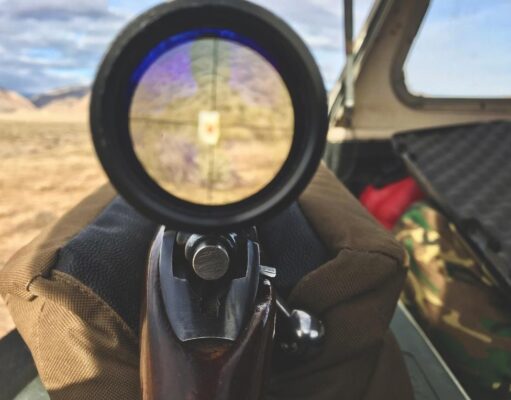 Looking at target through rifle scope