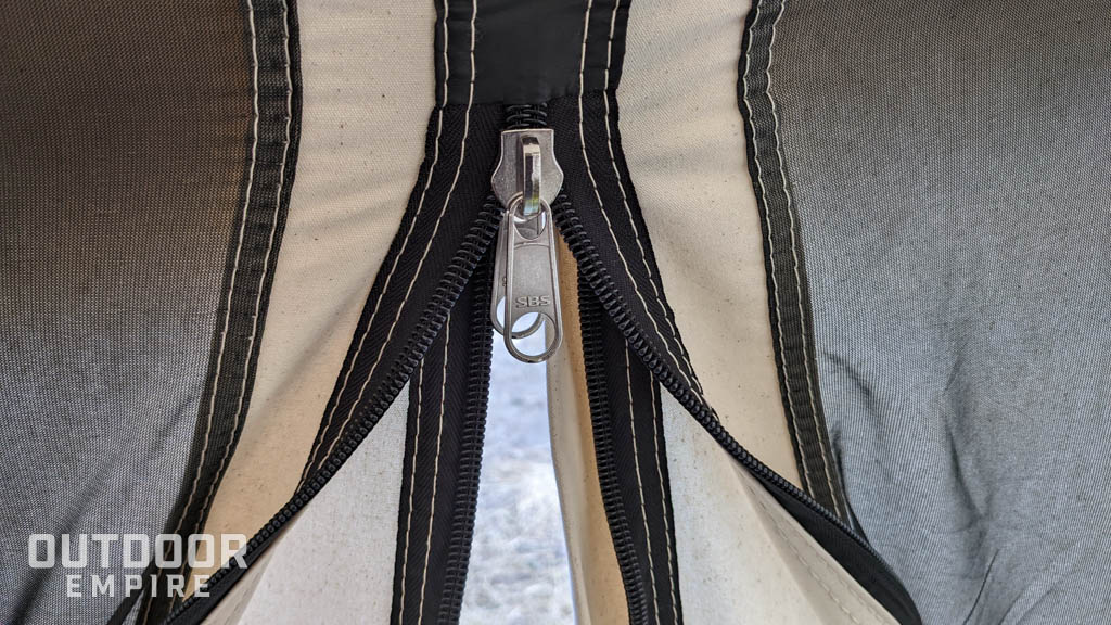 Zippers on springbar tent door