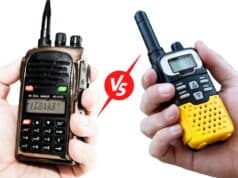 Handheld HAM radio in one hand and a walkie talkie in another hand with a vs symbol in between