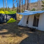 How much camping tents cost - two tents setup side by side in forest