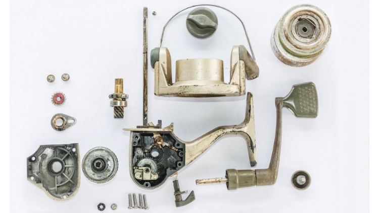 disassembled spinning reel