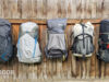 Five ultralight backpacks of 2023 for hiking hanging on a fence