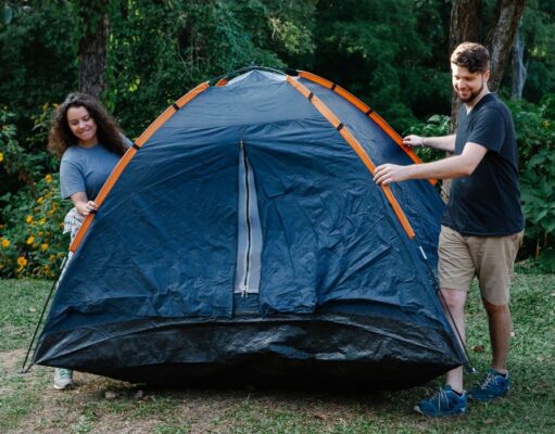 couple pitching tent