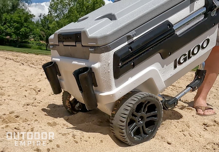 Igloo trailmate cooler being towed through deep sand