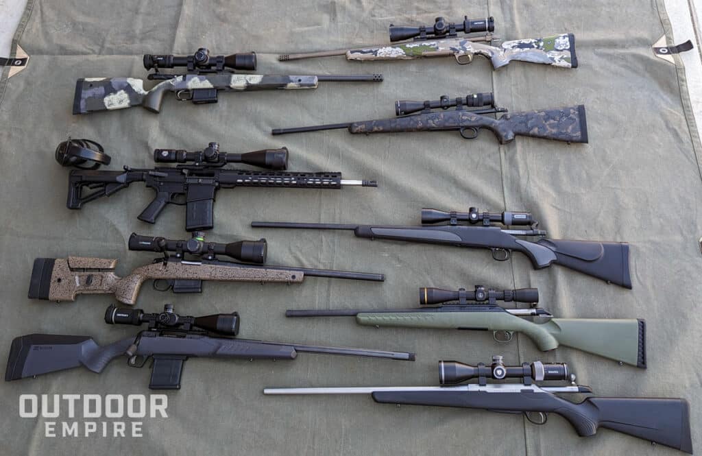 9 of the best 308 rifles for hunting and target shooting laying next to each other