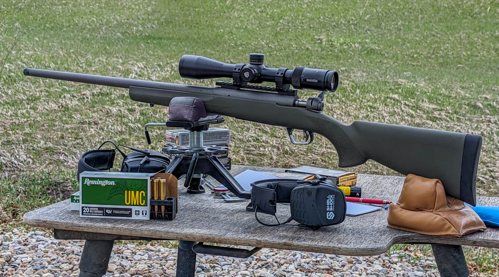 Savage 110 trail hunter rifle on shooting bench