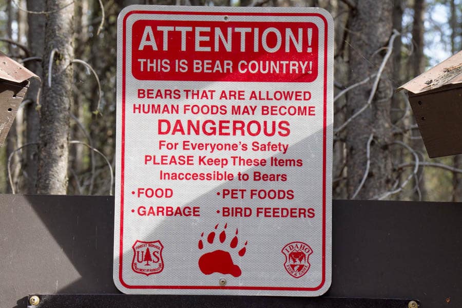 camping in bear country warning sign in campground